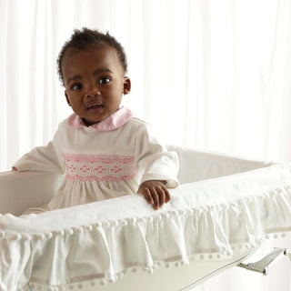 Pink Smocked One piece Footie
